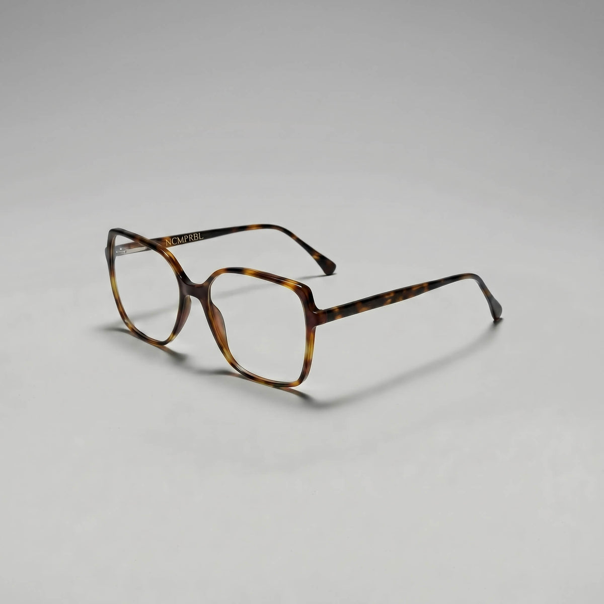 Close-up of Aura 02 Poise 53MM soft square prescription glasses in tortoise finish