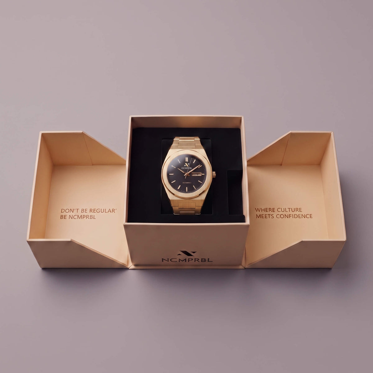 NCMPRBL Ascend Sphinx 03 42MM gold automatic watch in its presentation box