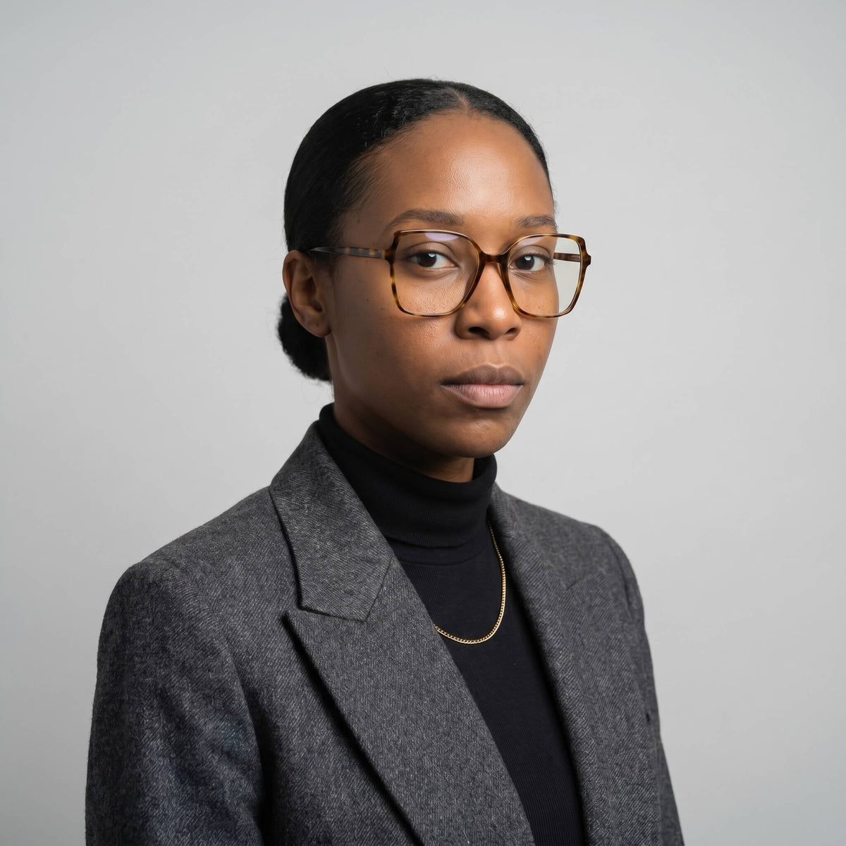 Aura 02 Poise 53MM tortoise eyeglasses worn by female model at 3/4 angle