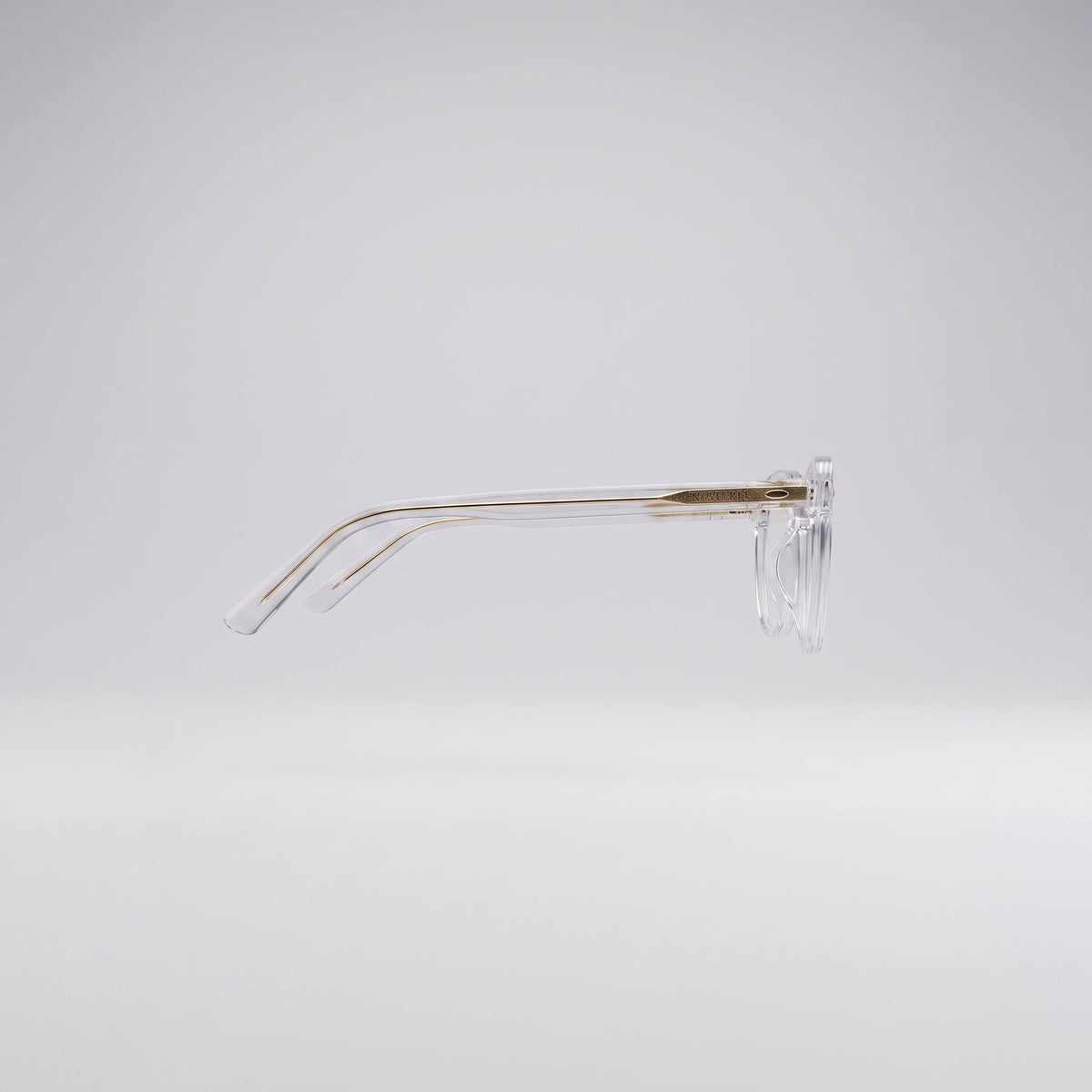 Close up side view of Clearview 46mm geometric clear acetate eyeglasses frame