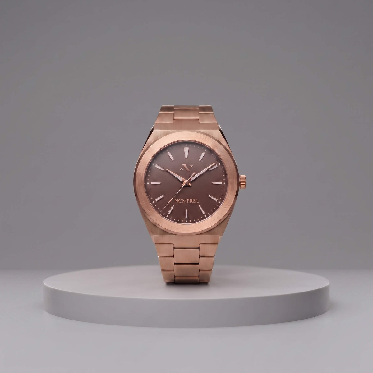 NCMPRBL Elevate Link Mocha 42mm Swiss quartz watch in brushed rose gold with mocha dial