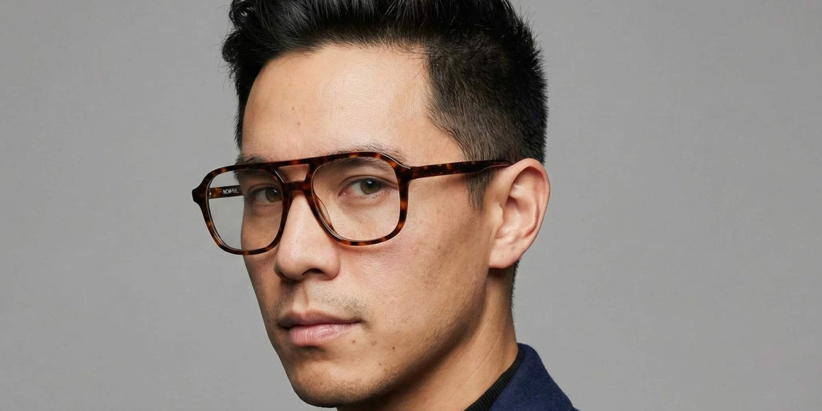 Axis eyewear collection hero image showcasing flat top acetate eyeglass frames in bold color finishes.