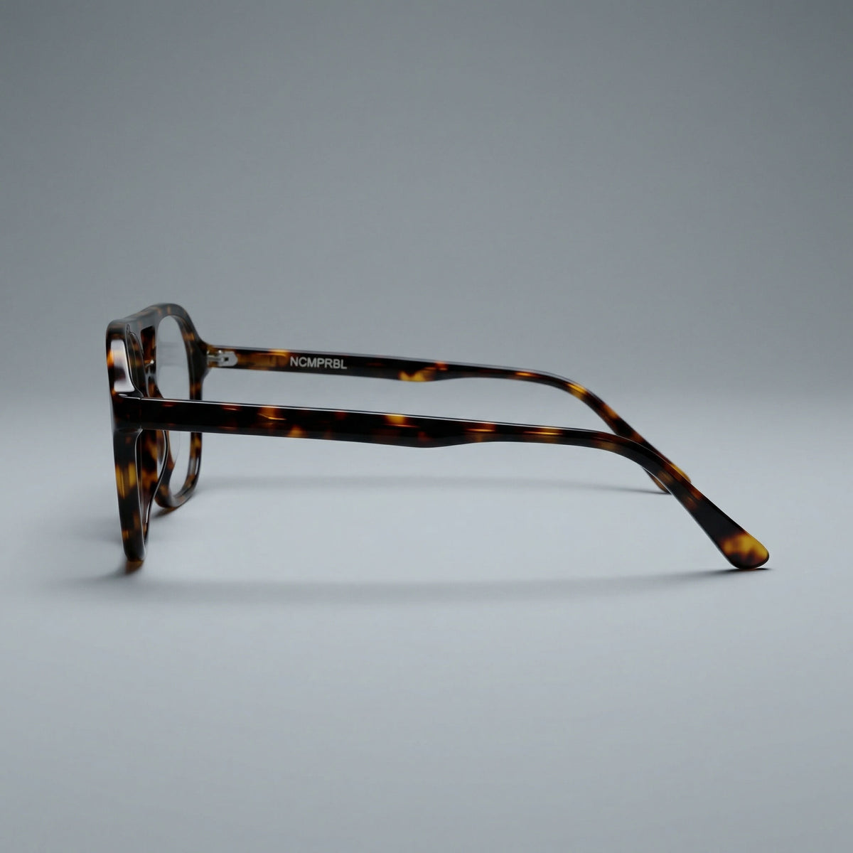 Close-up of espresso marble pattern on AXIS 02 53MM eyeglasses Blue Light Glasses frame