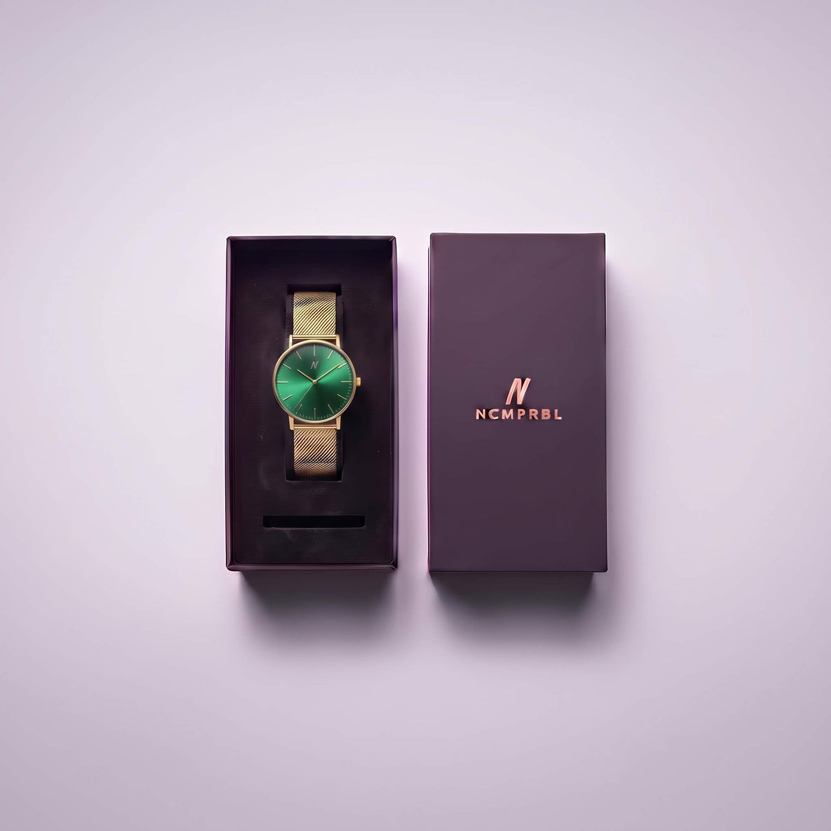 NCMPRBL Advance Mineral Green 40MM gold mesh watch in its presentation box