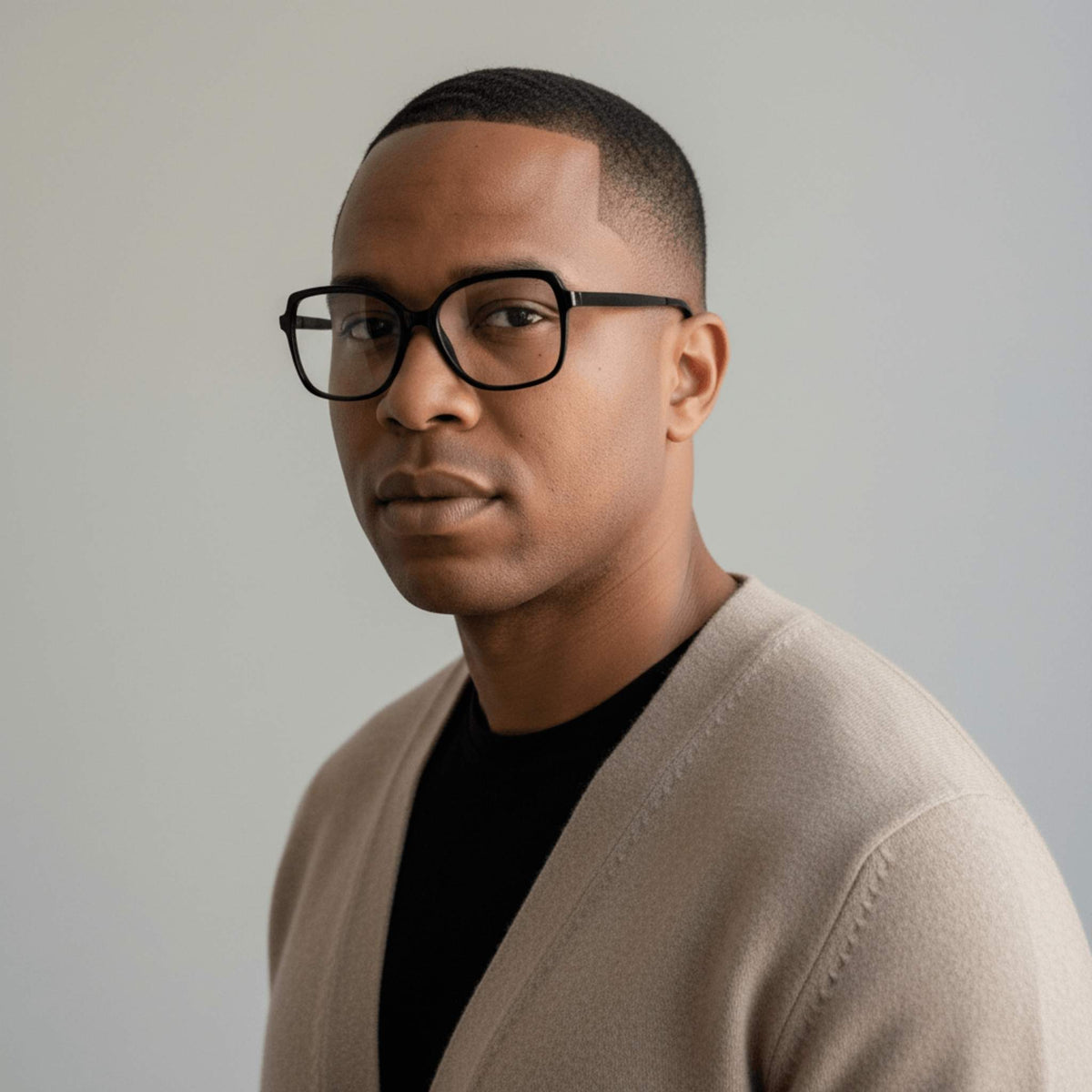 NCMPRBL Aura 01 black eyeglasses on male model highlighting refined design with virtual try-on online