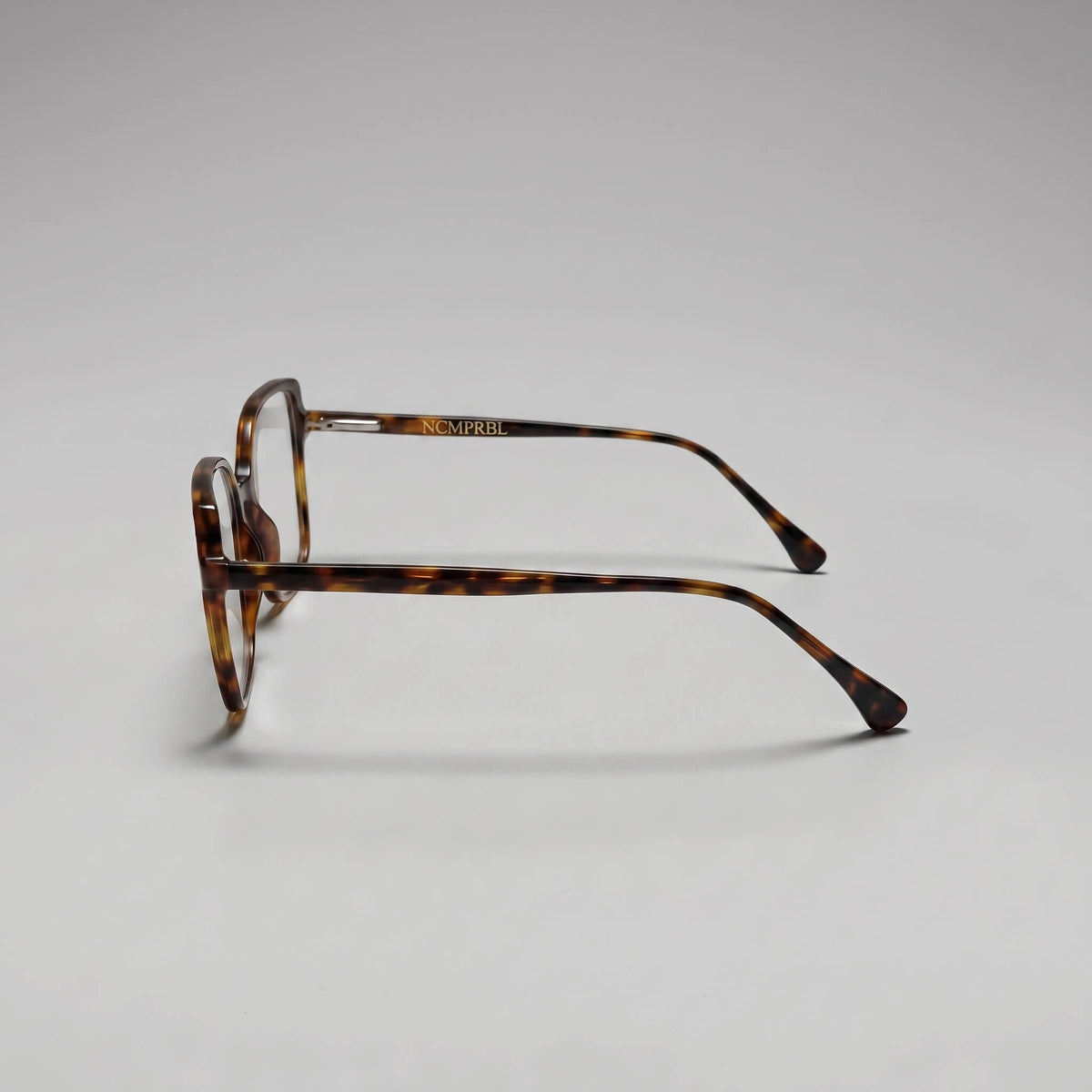 Side profile of Aura 02 Poise 53MM tortoise soft square eyeglasses frame