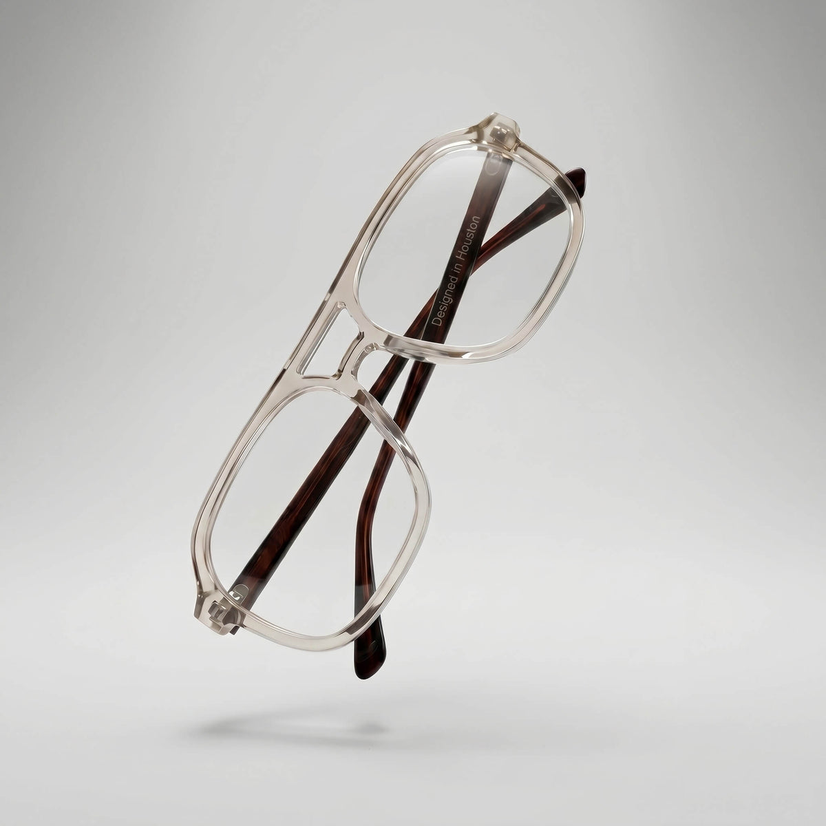 Detailed AXIS 03 eyeglasses frame in smoke oak with matte champagne and walnut tones