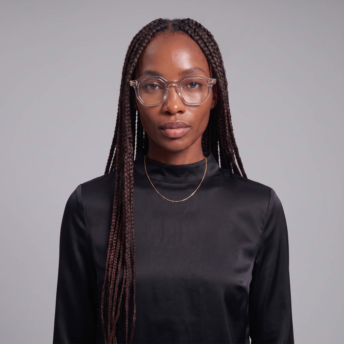 Female model with Clearview 46mm geometric clear eyeglasses front facing