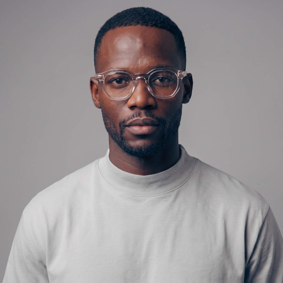 Male model wearing Clearview 46mm minimalist geometric clear glasses front view
