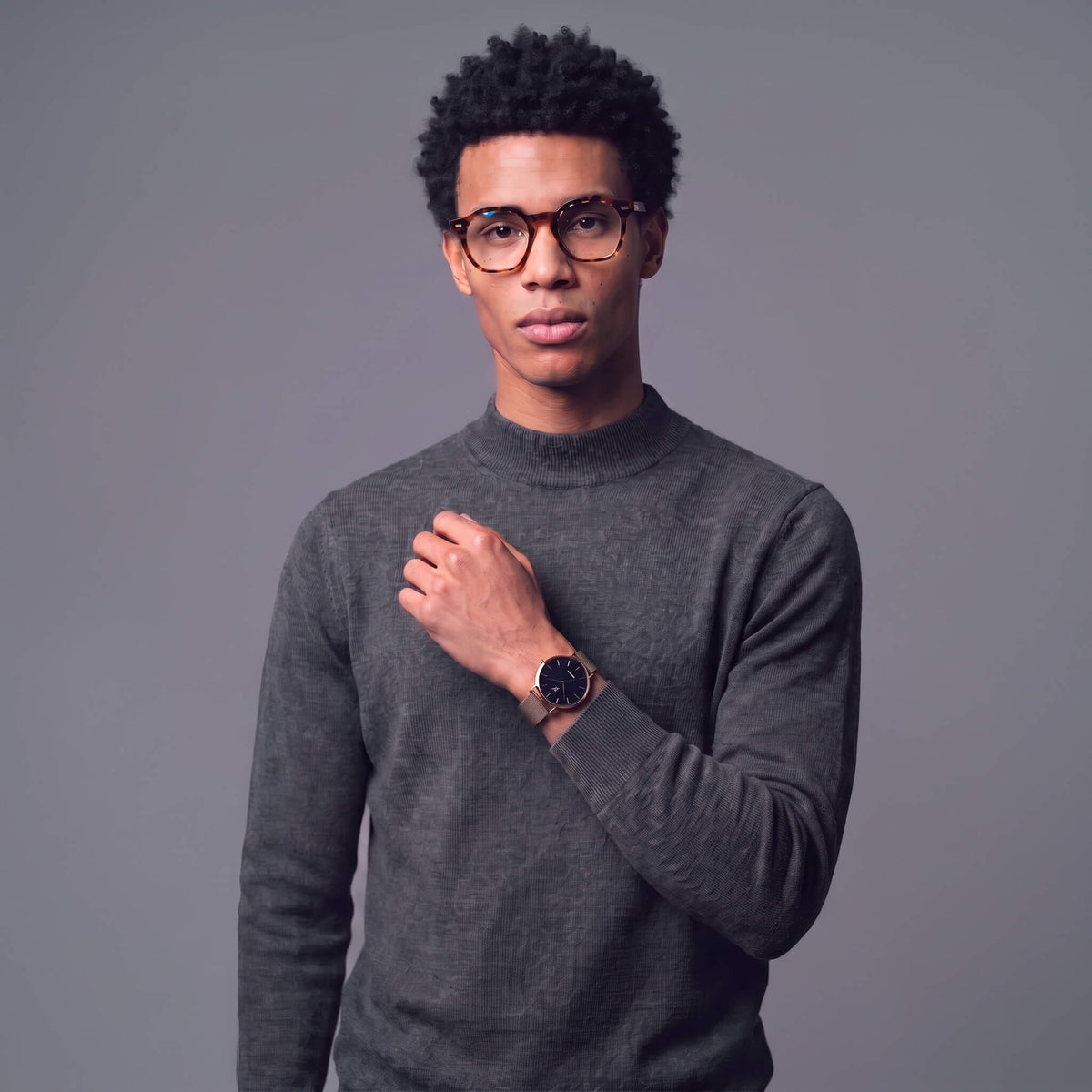 Model showcasing Advance CRWN rose gold watch with black dial, minimalist style, try virtual try-on at NCMPRBL studio