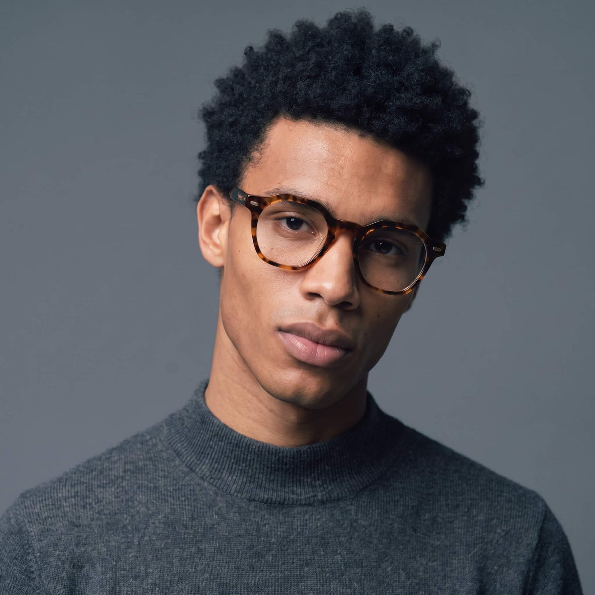 Dusk 46mm geometric eyeglasses brown tortoise on male model eyewear