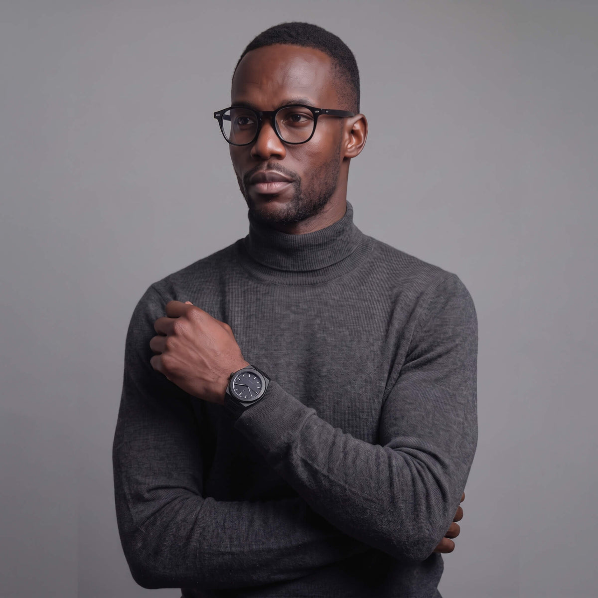 NCMPRBL Focused black eyeglasses paired with the Elevate Link Phantom 42mm watch