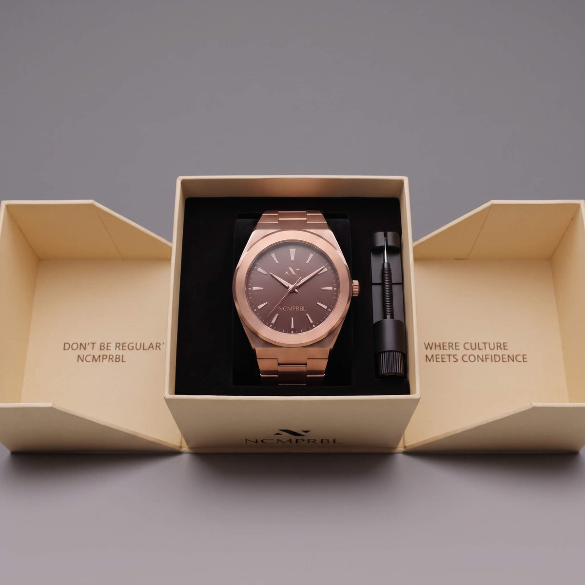 Elevate Link Mocha 42mm men's rose gold Swiss watch displayed in branded box