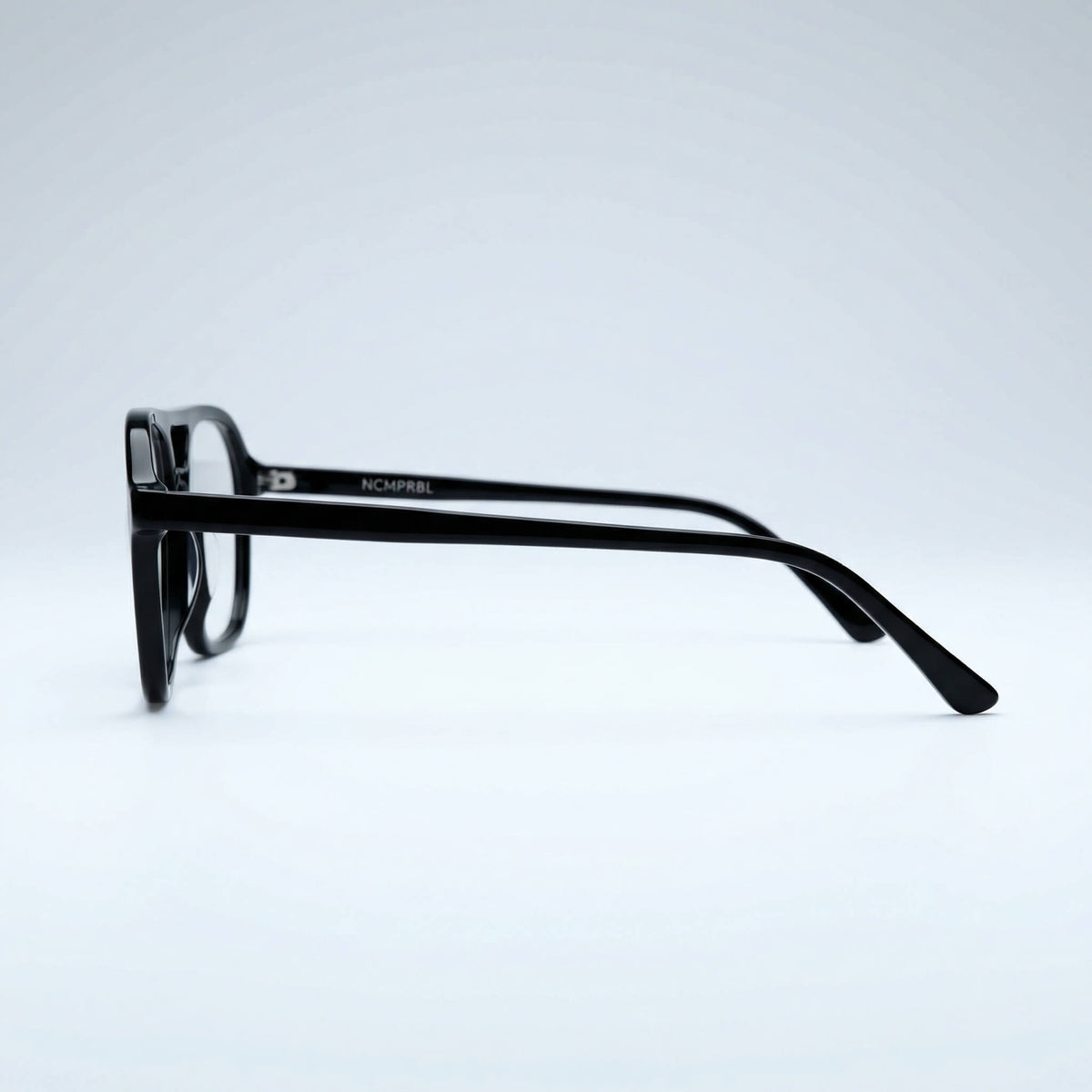 Axis Onyx Flat Top 53mm Black eyeglasses on a light gray background